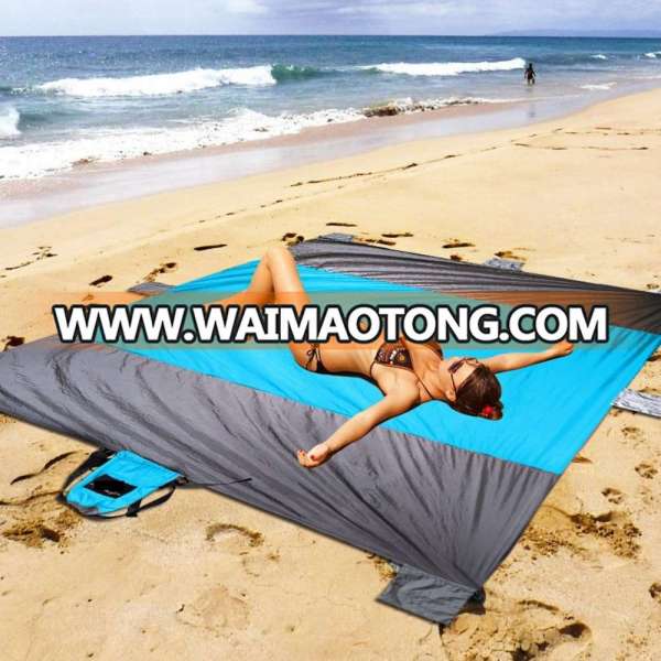 100% Nylon Sand Proof Beach Blanket Oversized 7' x 9' Quick Drying, water resistance Durable Design 6 Sand Pockets beach mat